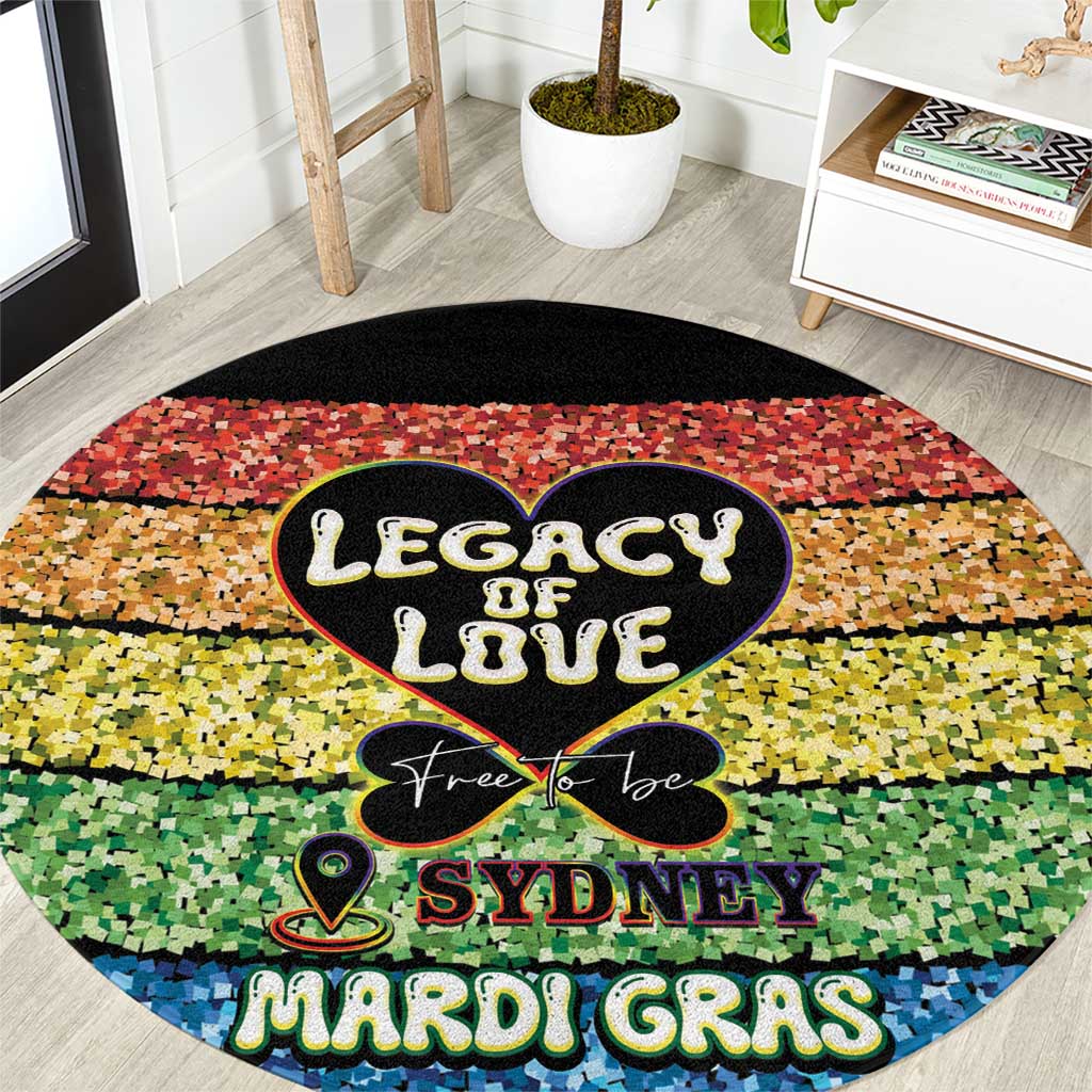 Round black Mardi Gras mosaic carpet with Legacy of Love Sydney text heart graphic