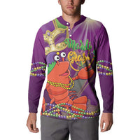 Purple button sweatshirt worn by man with front Mardi Gras jester-lobster design
