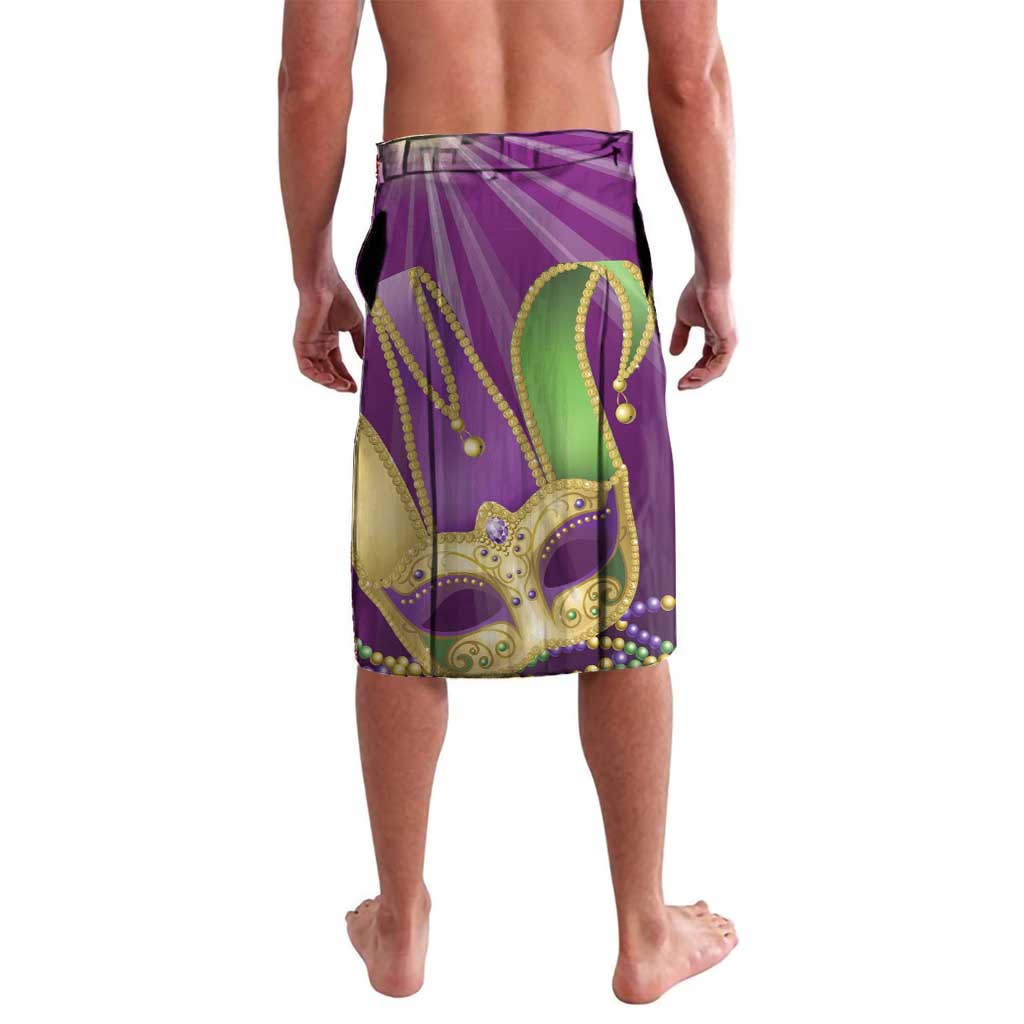 Purple sarong-style shorts with jester mask pattern and beaded trim detail