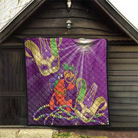 Purple quilt laid against dark wood wall with jester lobster, beads, and fleur-de-lis accents