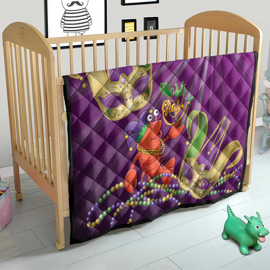 Purple quilt in crib with jester lobster print, Mardi Gras beads, and gold fleur-de-lis details