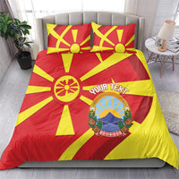 Macedonia flag duvet and pillow set, red and yellow sunburst design with circular emblem