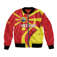 Red and yellow bomber jacket with front zipper and country graphic, ribbed cuffs