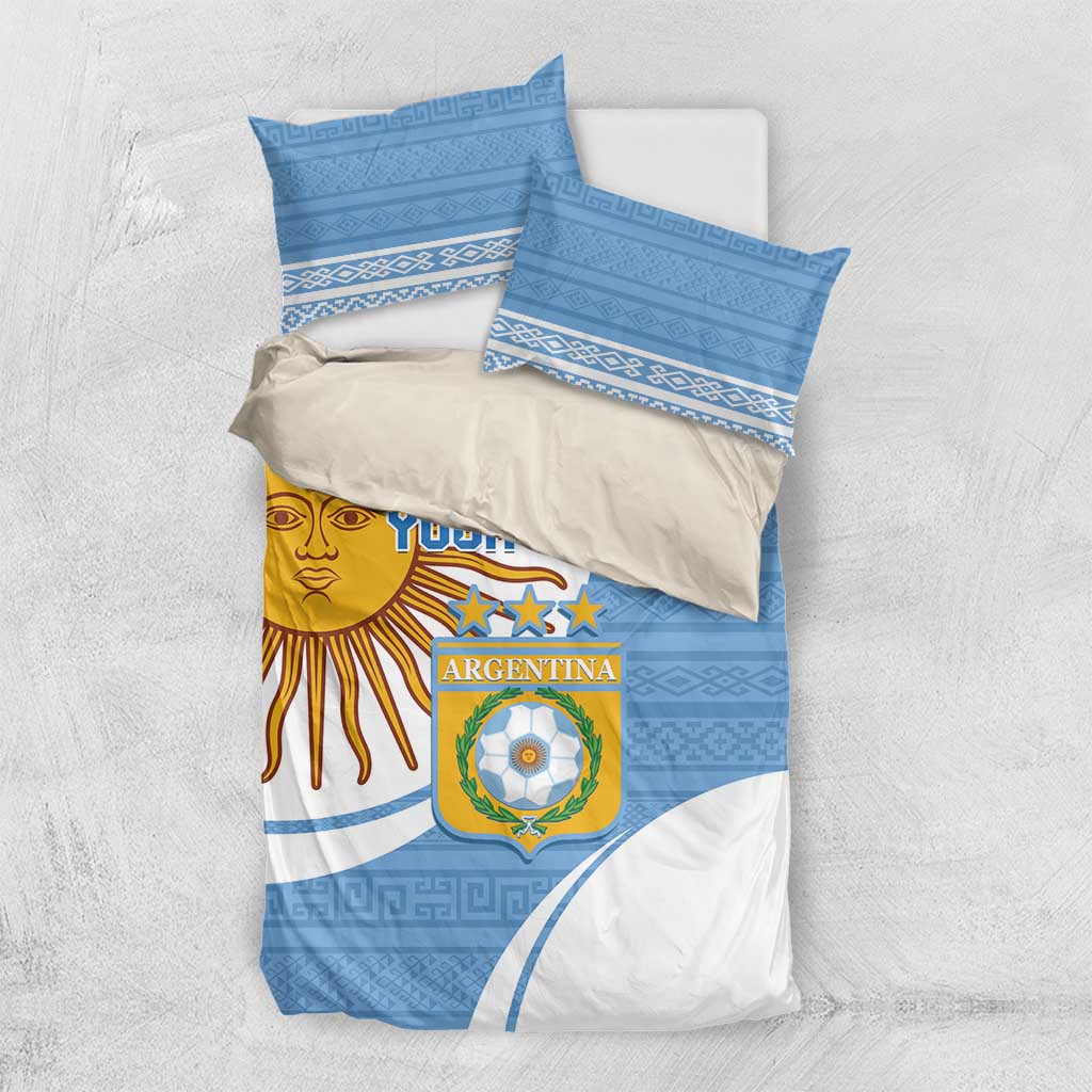 Sky blue Argentina-themed duvet cover and pillow set with sun face and crest badge