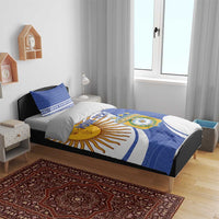 Argentina-themed bedding set on bed with blue-and-white sun and Argentina crest graphic
