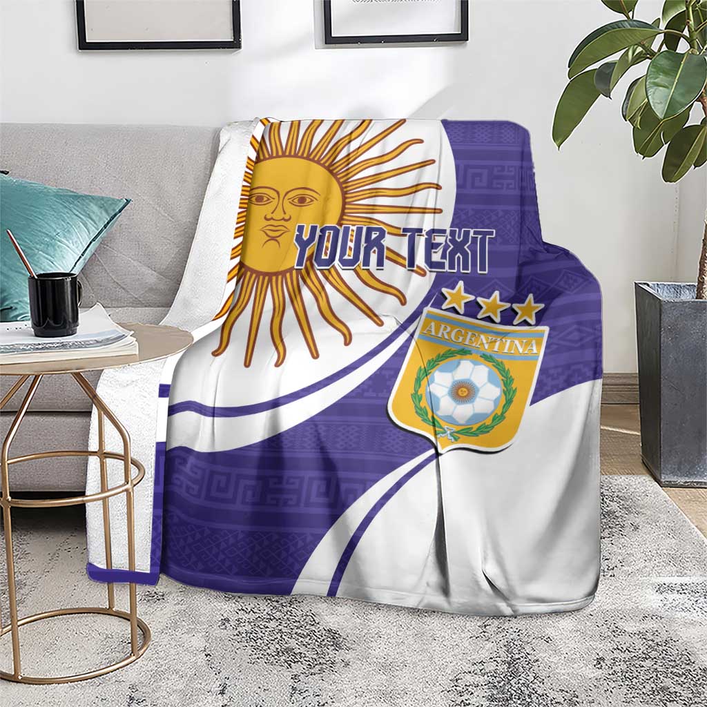 Purple and white Argentina football blanket on floor near sofa, sun emblem and Your Text