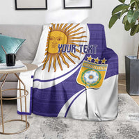 Purple and white Argentina football blanket on floor near sofa, sun emblem and Your Text