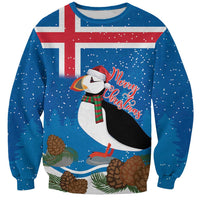 Blue Christmas sweatshirt with Iceland flag print, puffin graphic, and Merry Christmas text