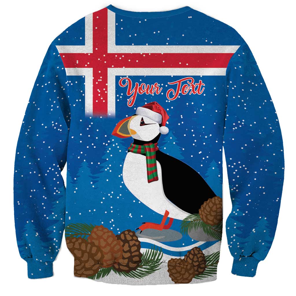 Blue Christmas sweatshirt with Iceland flag print, puffin graphic, and Your Text on back