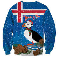 Blue Christmas sweatshirt with Iceland flag print, puffin graphic, and Your Text on back
