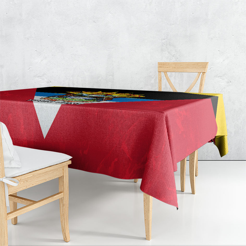 Red and yellow patriotic anniversary tablecloth covering rectangular dining table