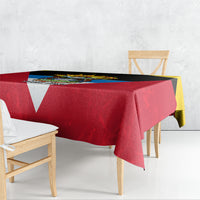 Red and yellow patriotic anniversary tablecloth covering rectangular dining table