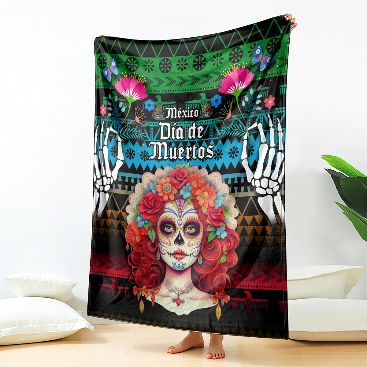 Day of the Dead blanket with centered Catrina skull portrait, red floral headdress, green-blue patterns