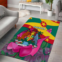 Green area rug showing Grenada flag stripes, coat of arms, and pink flowers design