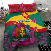 Grenada bedding set on bed with bold flag stripes, "GRENADA" text, and pink blossoms