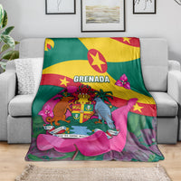 Grenada flag blanket draped over sofa featuring crest, birds, and bright pink blossoms
