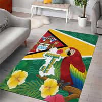 Green tropical area rug with red-and-blue macaw, Guyana map graphic, and yellow flowers