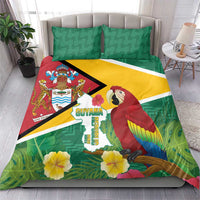 Guyana-themed duvet set with green patterned pillows, macaw and flag artwork, yellow accents