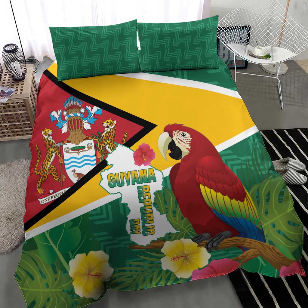 Tropical Guyana bedding set with green pillows, macaw graphic, and hibiscus flowers on duvet