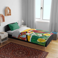 Tropical Guyana bedding set on bed with green pillows; duvet shows macaw and flag design