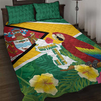 Green tropical quilt bed set with macaw, flowers, and Guyana map; two matching pillows.