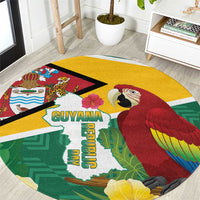 Round tropical map carpet with scarlet macaw, yellow and green sections, Guyana text