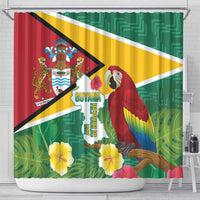 Guyana shower curtain featuring flag colors, scarlet macaw, tropical flowers, and map graphics