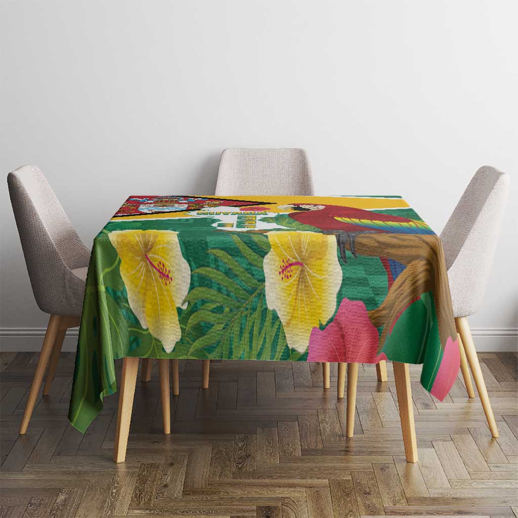 Rectangular tropical tablecloth in green with yellow edging and macaw and map artwork