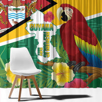 Window curtain close-up with Guyana map text, scarlet macaw, flowers, and flag colors.