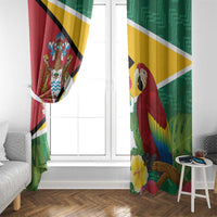 Pair of Guyana flag style window curtains with scarlet macaw and tropical flowers on green and red.