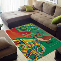 Green decorative area rug featuring colorful dragon, bird, and “Happy Mashramani” lettering