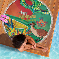 Round beach blanket with green centerpiece, bird and dragon graphics, white fringed border