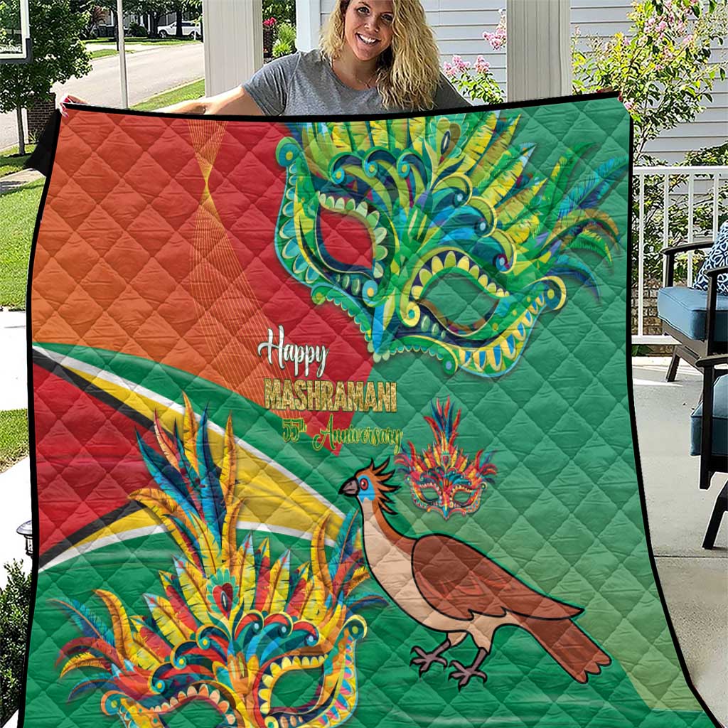 Red and green quilt with colorful bird, dragon, and “Happy Mashramani” design