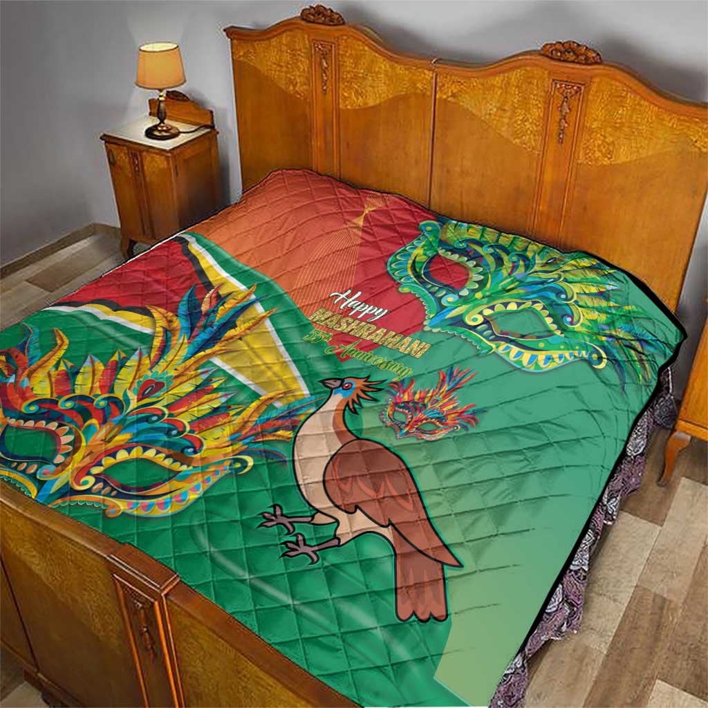 Green and red quilt spread on bed with bird and dragon mask graphic
