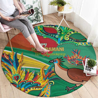 Round decorative carpet, green-red design with 'Happy Mashramani' lettering, bird and dragon artwork