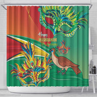 Red and green shower curtain with 'Happy Mashramani' text, ornate mask, and bird