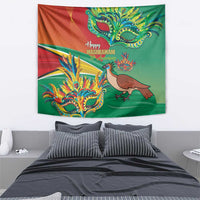 Happy Mashramani tapestry featuring colorful masks and a brown bird on red-green background.