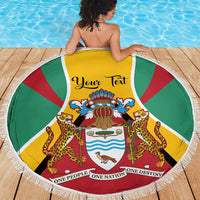 Personalized Guyana beach blanket with “Your Text” over coat of arms, round fringed border