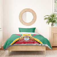 Green Guyana bedding set with coat of arms flag duvet and two matching pillowcases on single bed