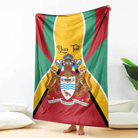 Guyana flag themed personalized blanket draped with coat of arms crest in the center
