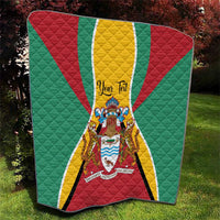 Square Guyana crest quilt blanket with green field, red accents, and yellow center panel