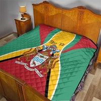 Bedroom bedspread quilt with Guyana flag colors and central crest emblem