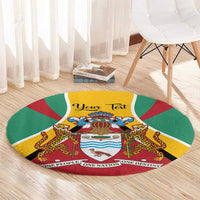 Round rug with Guyana coat of arms crest, circular red green yellow design