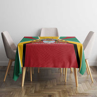 Guyana coat of arms tablecloth on dining table, red center with green sides and yellow trim