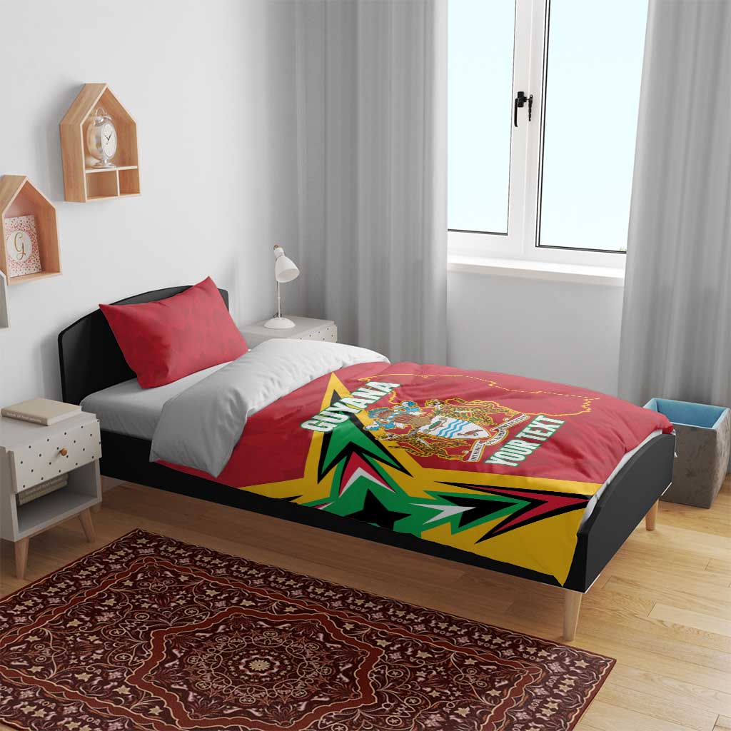 Red Guyana duvet on bed with crest and map outline; green-yellow burst and custom text