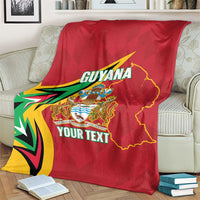 Red Guyana cricket blanket with crest and YOUR TEXT, shown on sofa back