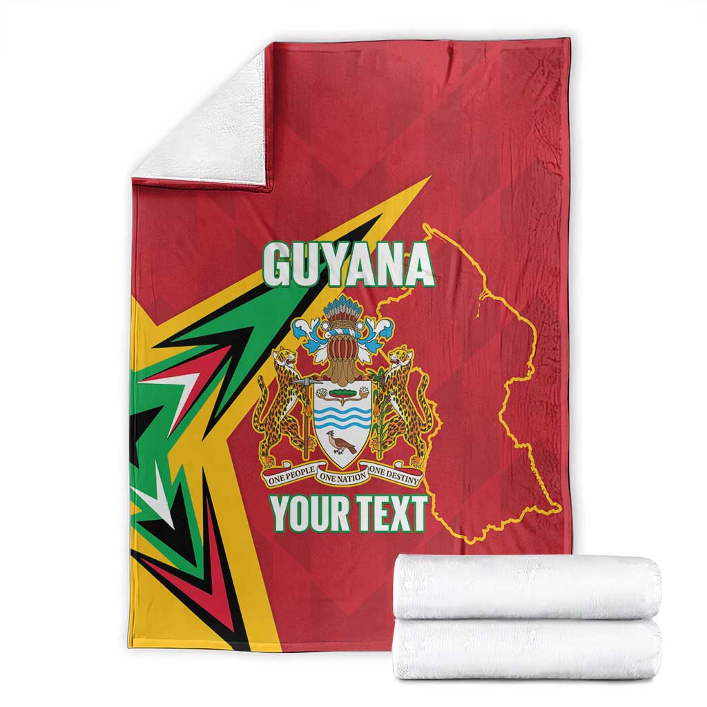 Red Guyana cricket blanket with crest and YOUR TEXT, folded with rolled blankets