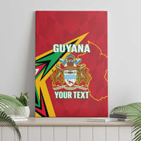 Red Guyana canvas print on wall with crest emblem, map outline, and custom text