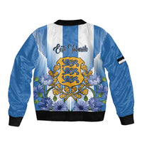 Blue and white bomber jacket, black ribbed hem and collar, large crest with floral print