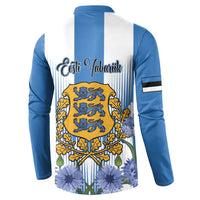Blue button sweatshirt back graphic with crest emblem, floral motifs, and vertical stripes